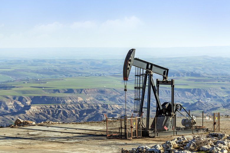 Oil pump jack on a field site